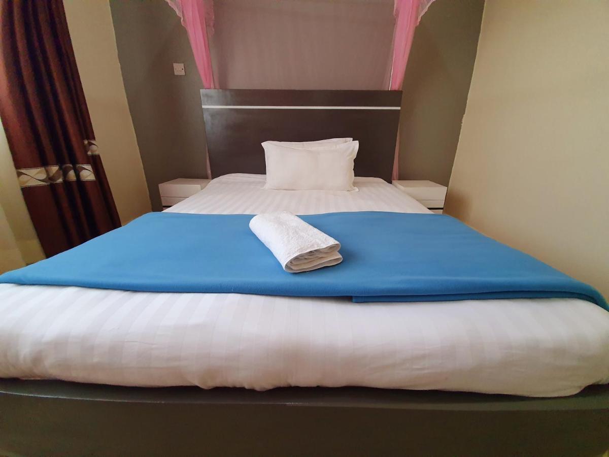 Airport Unique Hotel Entebbe Exteriör bild