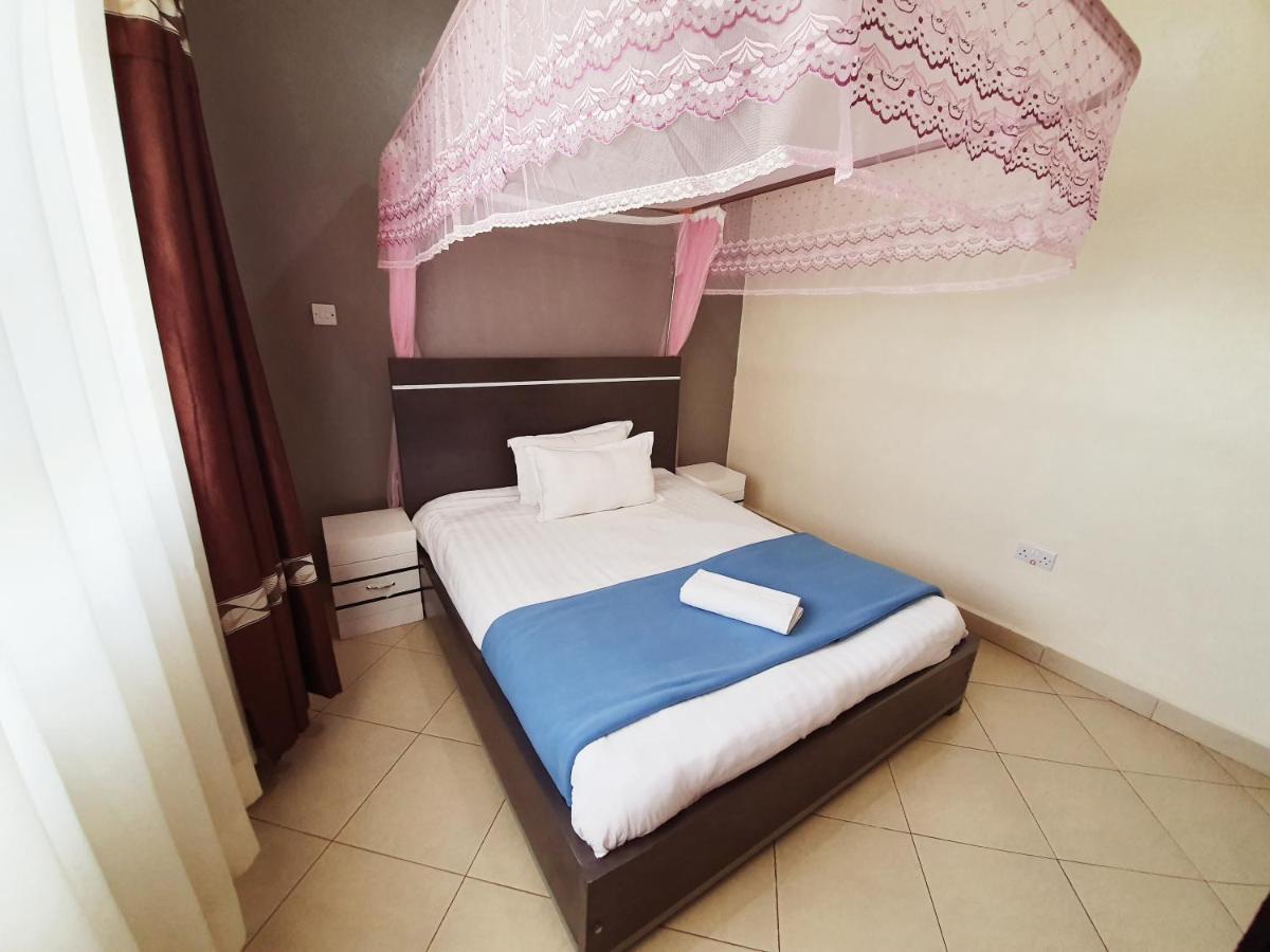 Airport Unique Hotel Entebbe Exteriör bild